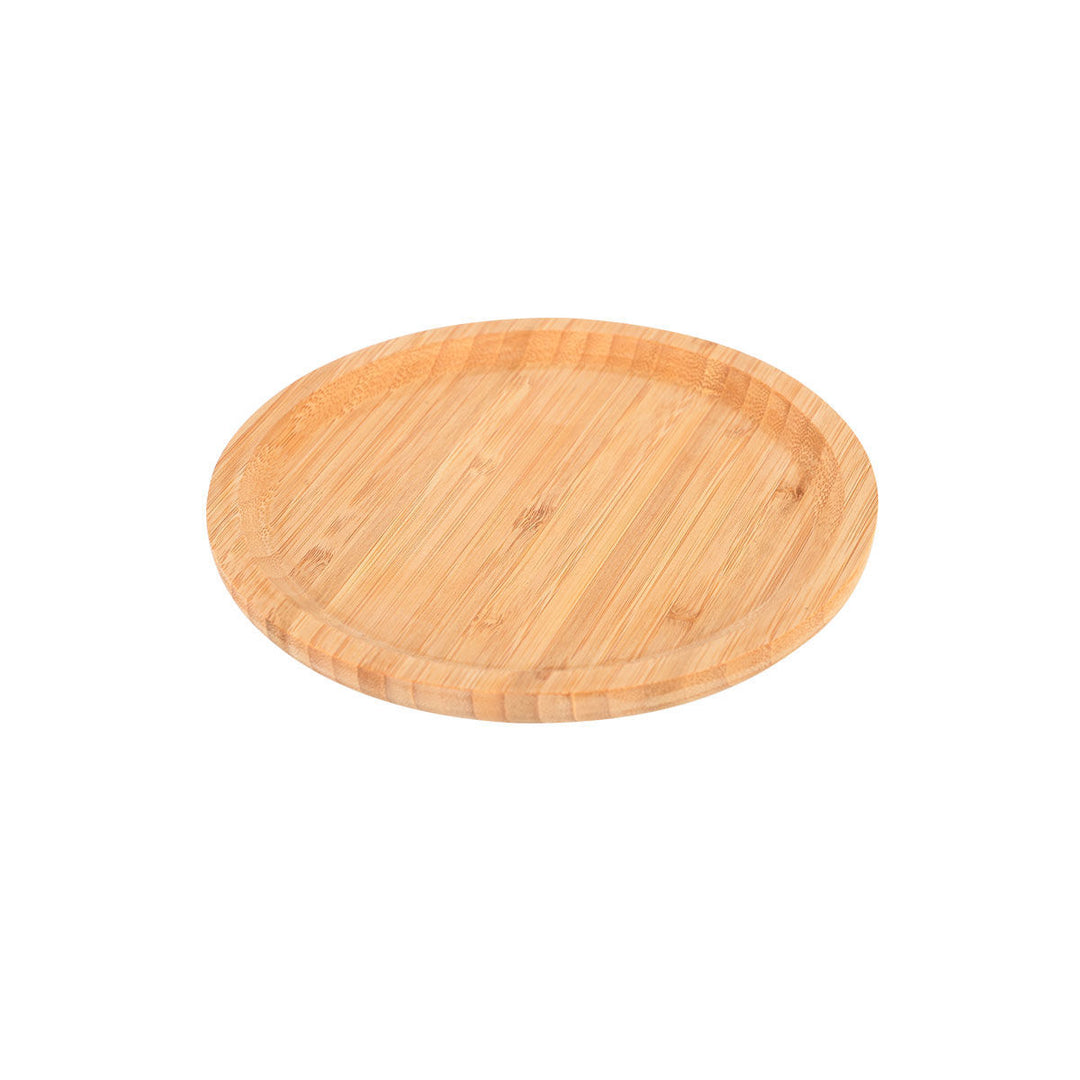 Πάνω όψη στρογγυλής ξύλινης βάσης από bamboo σε φυσική απόχρωση, με καθαρές γραμμές και λεία επιφάνεια σε λευκό φόντο.
