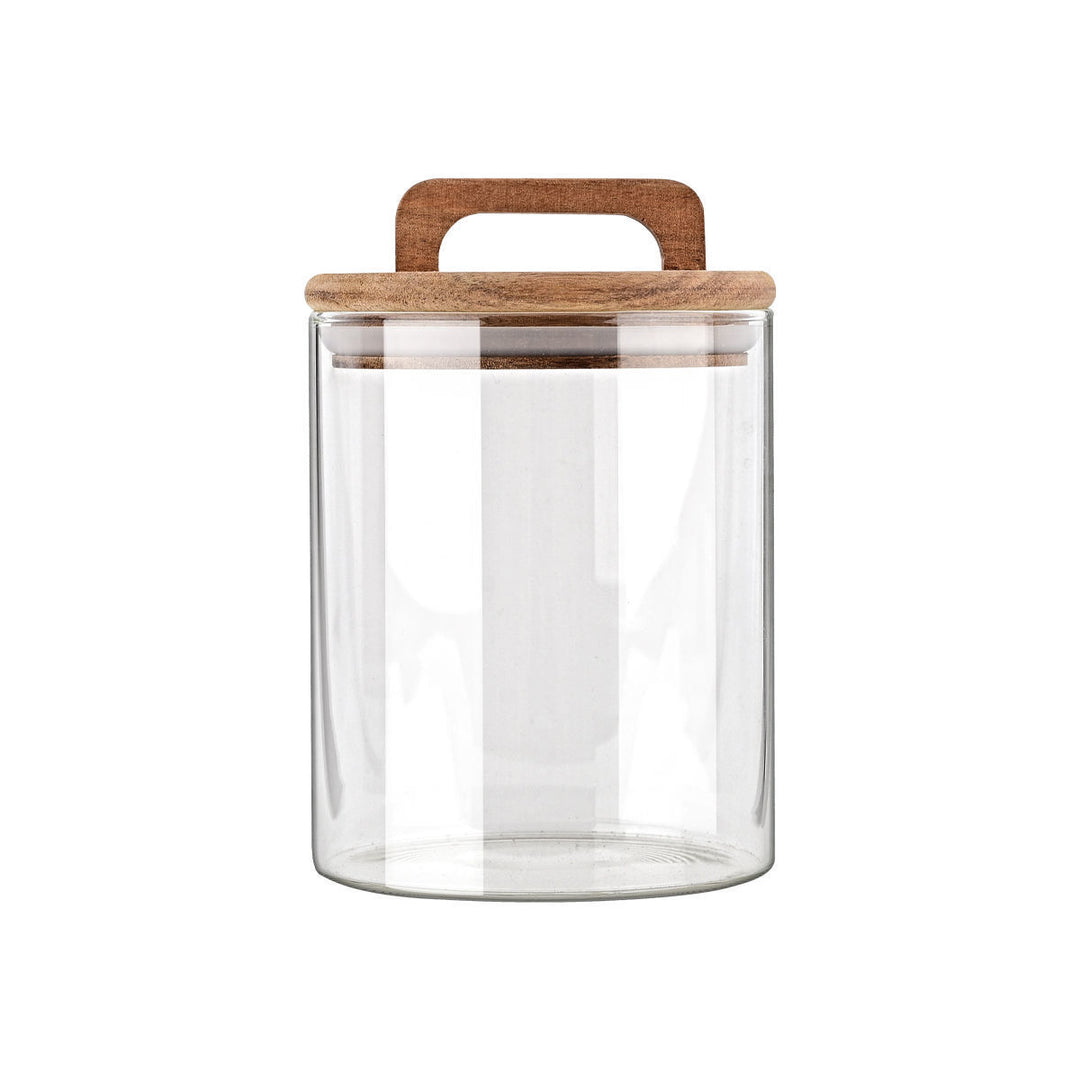 Γυάλινο δοχείο αποθήκευσης με ξύλινο καπάκι και λαβή, σε λευκό φόντο, ιδανικό για αποθήκευση ξηρών τροφίμων ή ροφημάτων στην κουζίνα.
