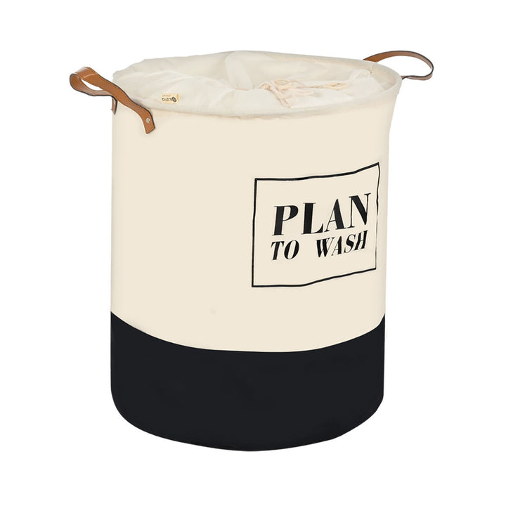 Πτυσσόμενο καλάθι απλύτων Estia Plan με υφασμάτινη επιφάνεια, κορδόνι κλεισίματος και πρακτικά χερούλια για εύκολη μεταφορά.
