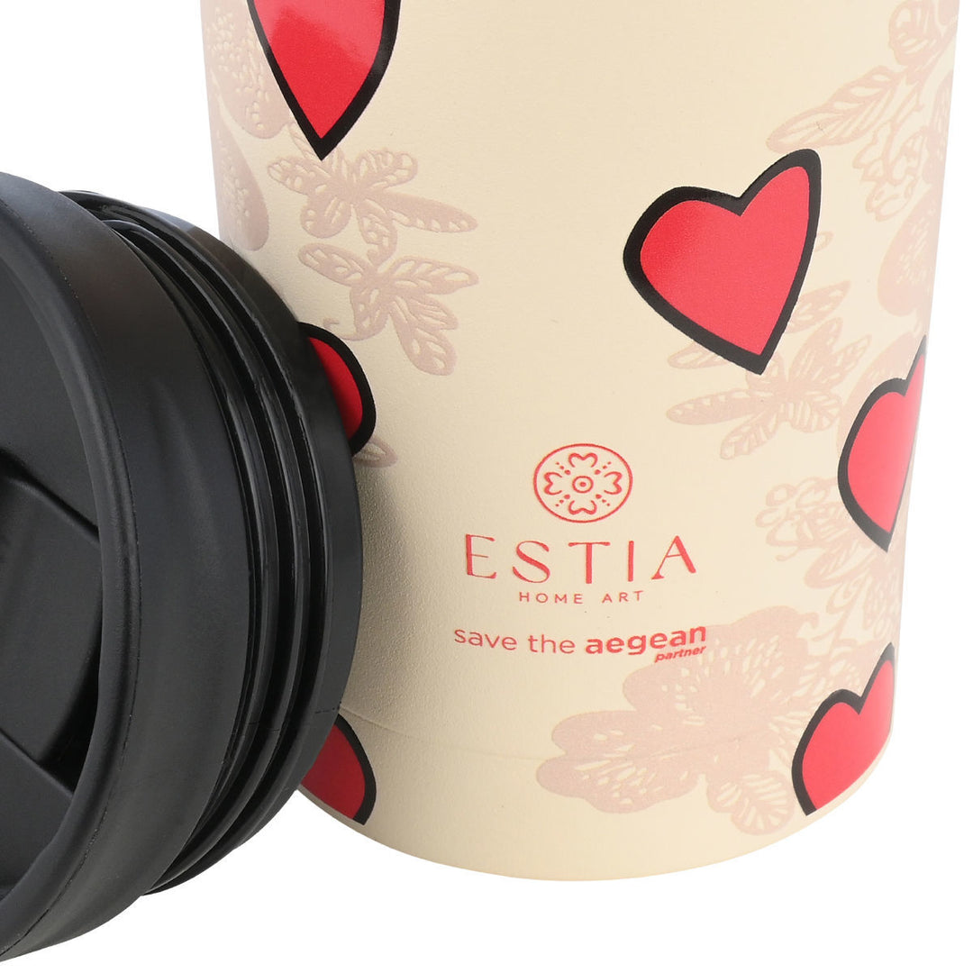 Κοντινό σε λογότυπο estia home art θερμού με ξεβιδωμένο καπάκι μαύρο δίπλα του