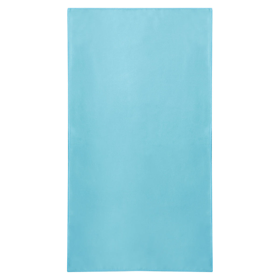 Μονόχρωμη γαλάζια πετσέτα θαλάσσης microfiber Estia σε ουδέτερο φόντο, με λιτή αισθητική και απαλή υφή.
