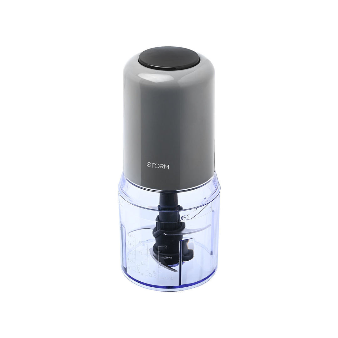 Ηλεκτρικός πολυκόπτης Storm Aroma 400W σε γκρι χρώμα με διαφανές μπολ, φωτογραφημένος υπό γωνία.