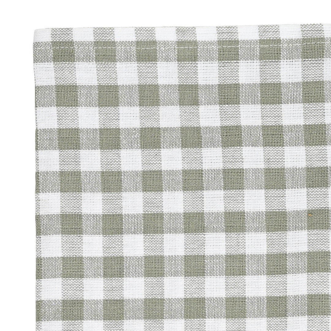 Κοντινή λήψη γκρι καρό πετσέτας κουζίνας με λεπτομερές υφαντό σχέδιο και καθαρό τελείωμα.