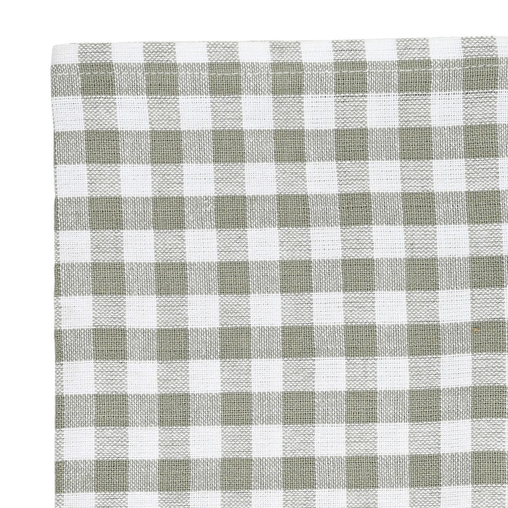 Κοντινή λήψη γκρι καρό πετσέτας κουζίνας με λεπτομερές υφαντό σχέδιο και καθαρό τελείωμα.