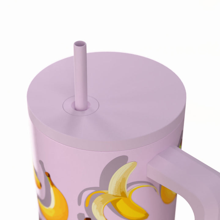 Κοντινή λήψη στο καπάκι και το σχέδιο Banana Mood με μπανάνες σε απαλό λιλά φόντο.