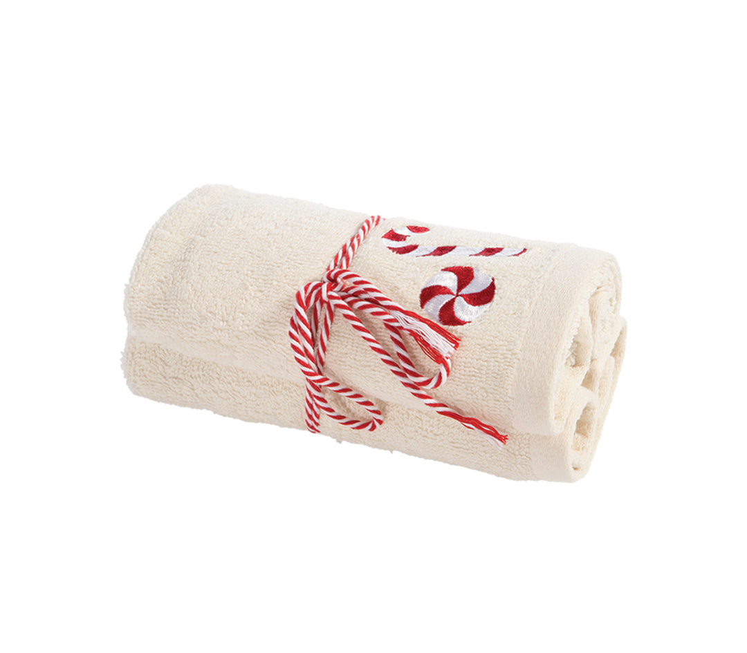 Πετσέτα σε εκρού απόχρωση με κεντημένες χριστουγεννιάτικες λεπτομέρειες candy cane και κόκκινο κορδόνι δεσίματος, της εταιρείας Nef Nef Homeware.