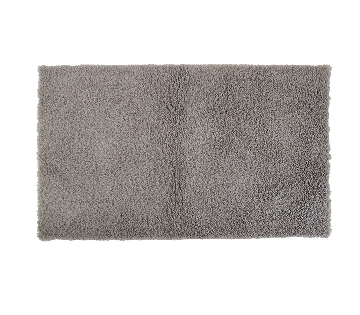Ορθογώνιο γκρι χαλί σε λευκό φόντο.