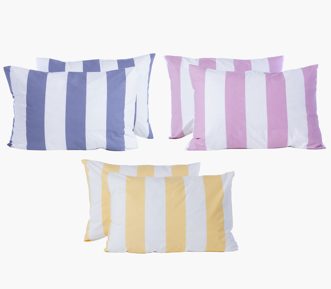 Τρεις μαξιλαροθήκες ύπνου Casual Vertia με ριγέ σχέδιο σε μπλε, ροζ και κίτρινη απόχρωση πάνω σε λευκό φόντο.