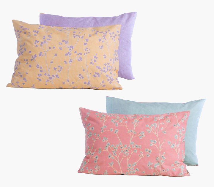 Βαμβακερές μαξιλαροθήκες ύπνου Nef-Nef Homeware με φλοράλ σχέδιο σε μουσταρδί και κοραλί αποχρώσεις σε λευκό φόντο.