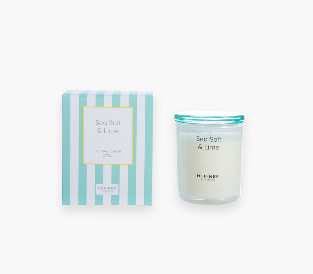 Αρωματικό κερί Sea Salt & Lime της Nef-Nef Homeware σε γυάλινο δοχείο με τιρκουάζ καπάκι και ριγέ τιρκουάζ συσκευασία.