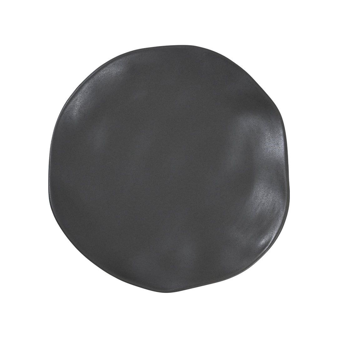 Άποψη από πάνω του γκρι πιάτου με ιδιαίτερο περίγραμμα και μονόχρωμη απόχρωση.