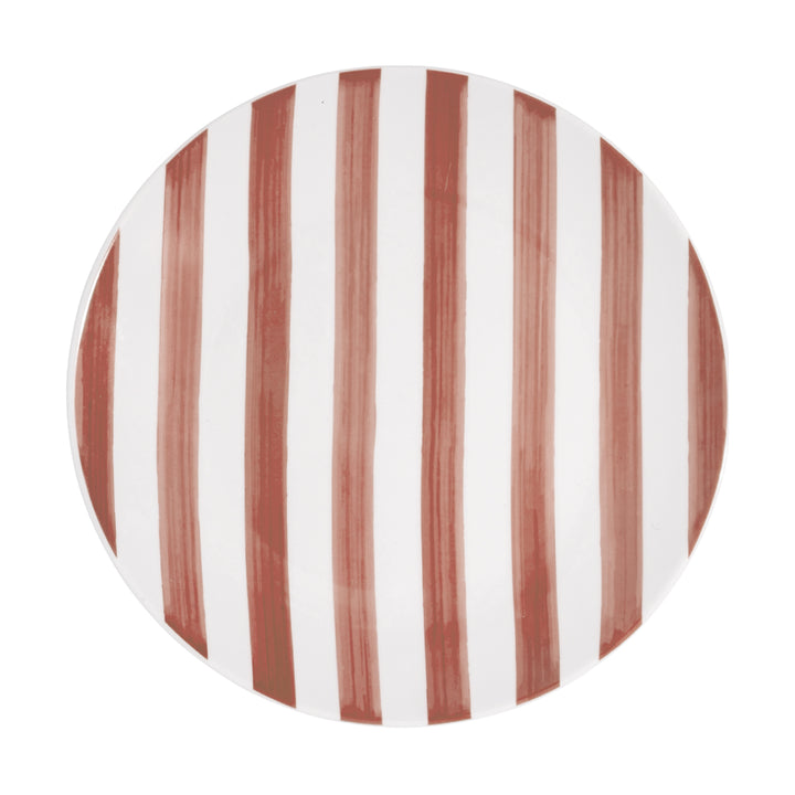 Ρηχό πορσελάνινο πιάτο Estia με ροζ ρίγες σε λευκή βάση και καθαρό φόντο.