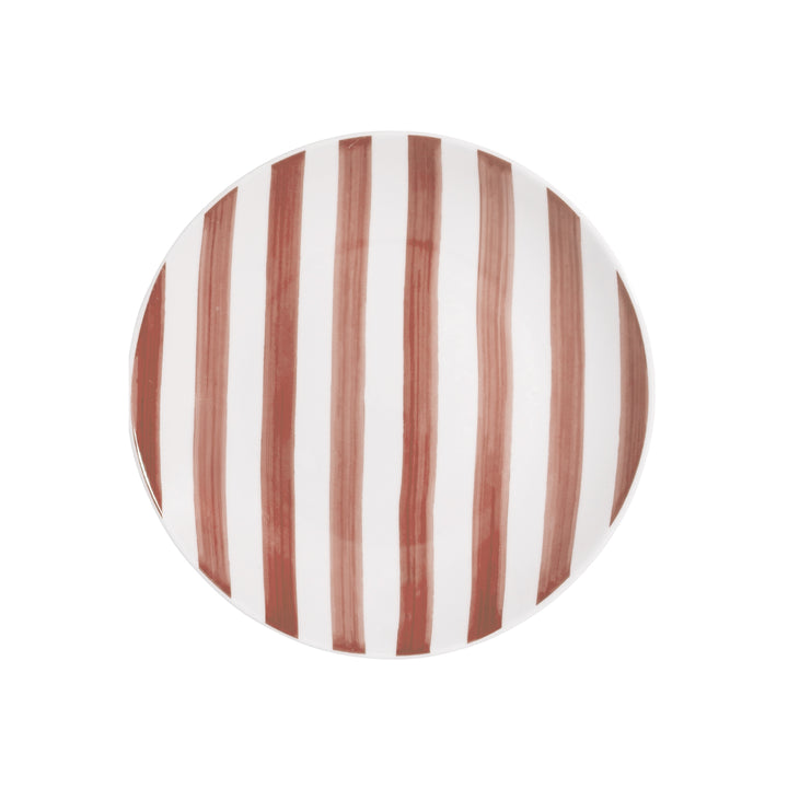 Ρηχό πορσελάνινο πιάτο Estia με ροζ ρίγες σε λευκή βάση και καθαρό φόντο.