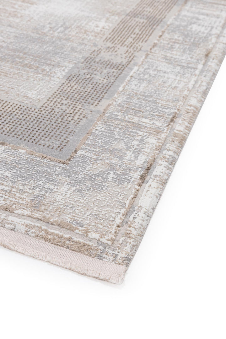 Χαλί Infinity της Royal Carpet σε εκρού, σε κοντινή λεπτομέρεια, με προσεγμένο σχέδιο της σειράς και εμφανή υφή επιφάνειας.