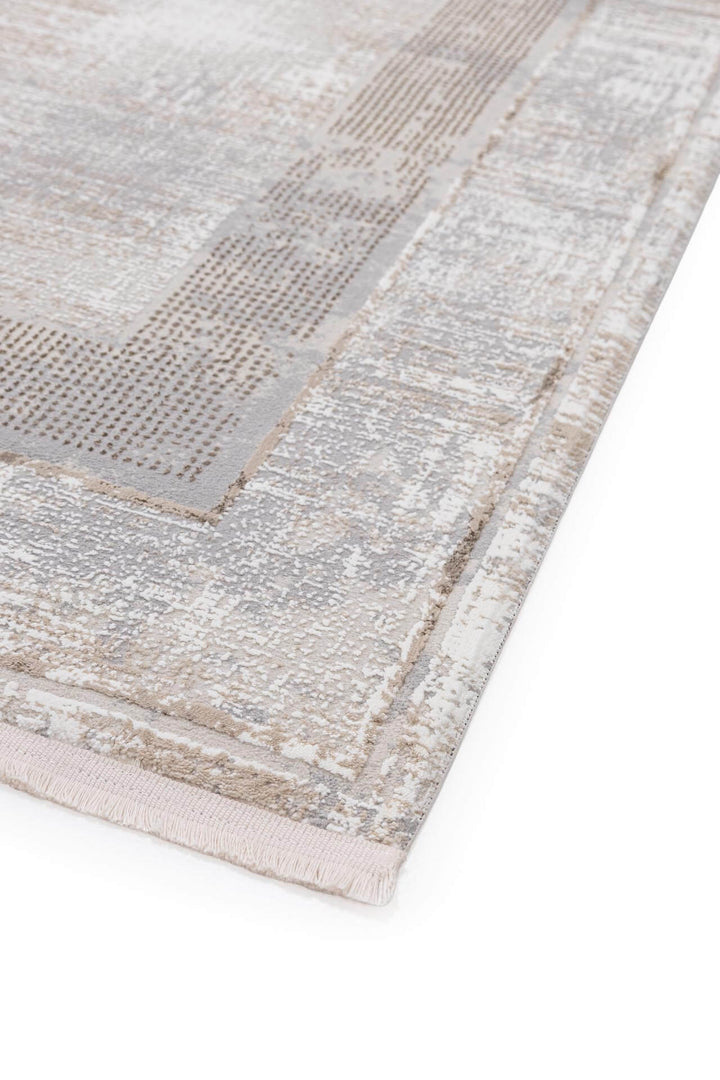 Χαλί Infinity της Royal Carpet σε εκρού, σε κοντινή λεπτομέρεια, με προσεγμένο σχέδιο της σειράς και εμφανή υφή επιφάνειας.