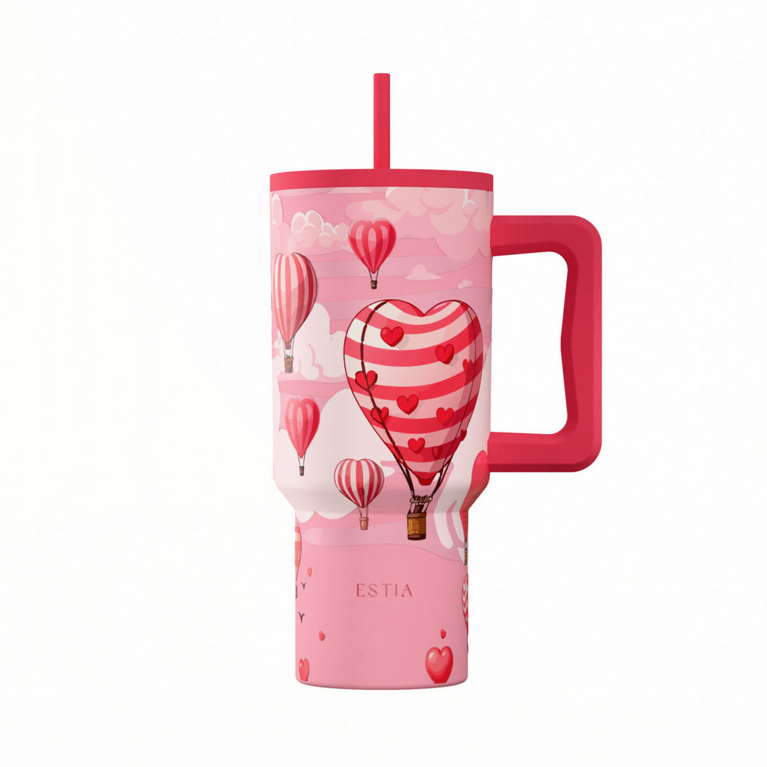 Θερμός Straw Tumbler XL Estia με ροζ σχέδιο από καρδιές και αερόστατα, εργονομική λαβή και καλαμάκι.