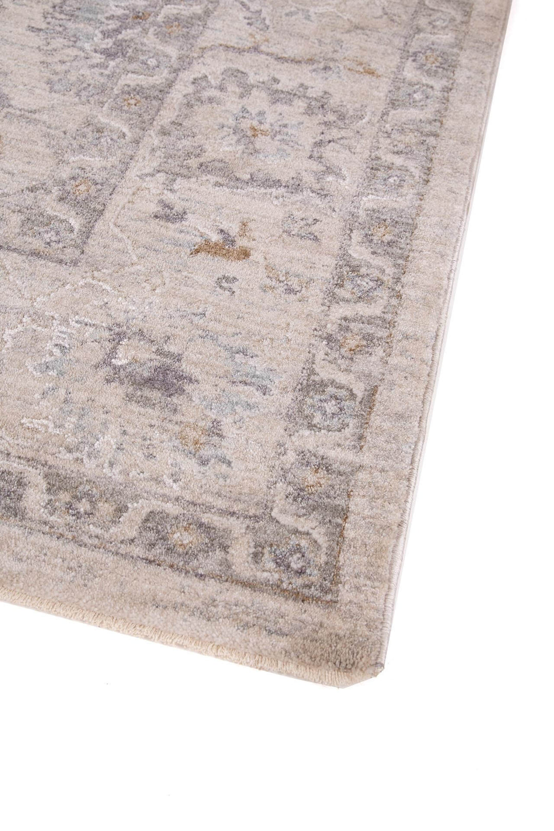 Χαλί Tabriz της Royal Carpet σε ανοιχτό γκρι, σε κοντινή λεπτομέρεια, με προσεγμένο σχέδιο της σειράς και εμφανή υφή επιφάνειας.