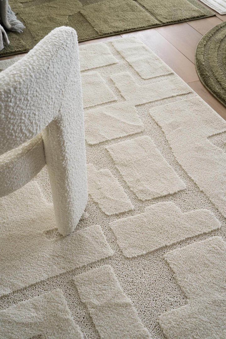 Χαλί Jazz της Royal Carpet σε εκρού, σε κοντινή όψη της επιφάνειας, με προσεγμένο σχέδιο της σειράς και εμφανή υφή επιφάνειας.