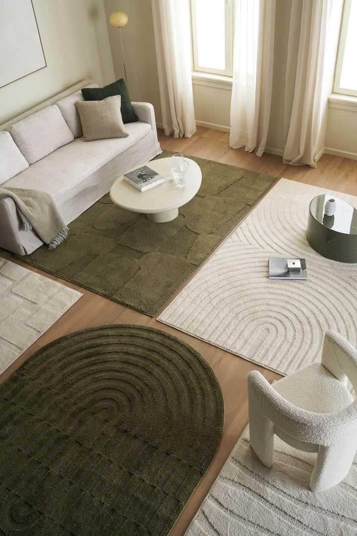 Οβάλ χαλί Jazz της Royal Carpet σε λαδί, σε κοντινή όψη της επιφάνειας, με προσεγμένο σχέδιο της σειράς και εμφανή υφή επιφάνειας.