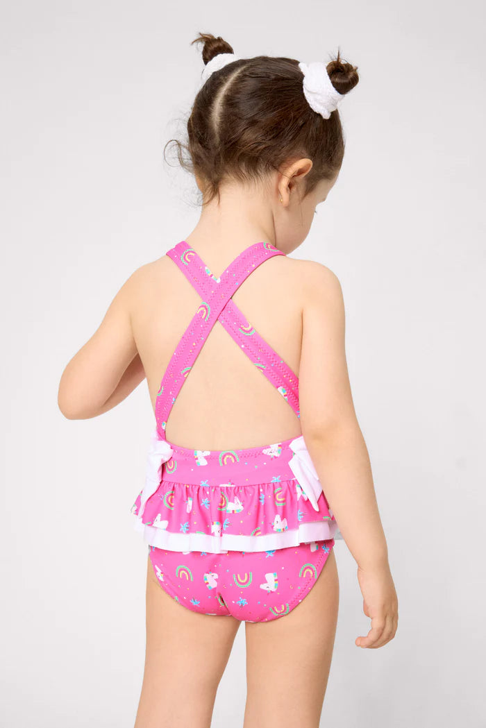 Παιδικό Ολόσωμο Μαγιό για Κορίτσι Ροζ με Βολάν & Φιόγκους και Σχέδιο με Μονόκερους Ysabel Mora